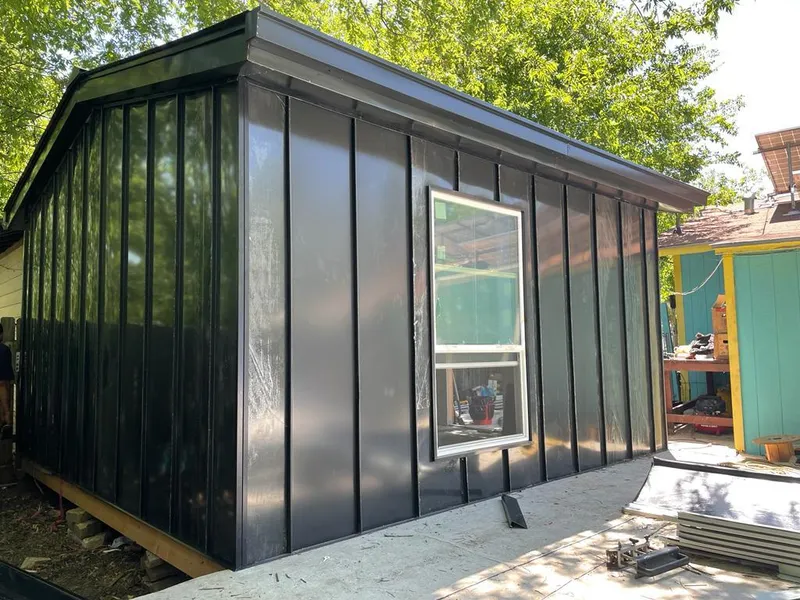 Black standing seam metal wall panels for Metal Roof Installation in Groves